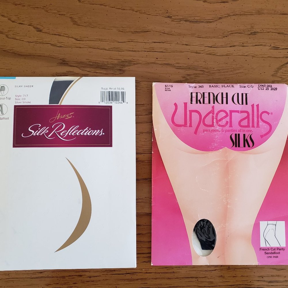 Two pairs of unopened black pantyhose